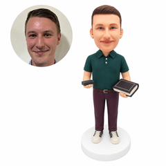 custom bobblehead figure male teacher holding a book and a blackboard eraser