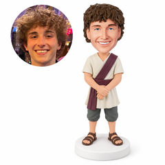 custom bobblehead figure man in a tunic and breeches with hands folded in front