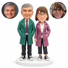 custom bobblehead figures couple in coats with three hands in pockets