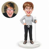 custom bobblehead figure female cleaner holding an upright mop with one hand on hip