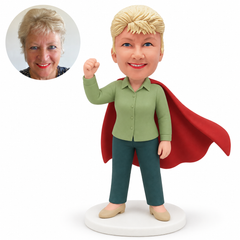 custom bobblehead figure woman in a cape raising a fist with the other arm down