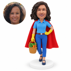 custom bobblehead figure female hero carrying a vegetable basket with one hand on her hip