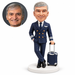 custom bobblehead figure male pilot holding a rolling suitcase with one hand in his pocket