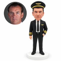 custom bobblehead figure male airline captain wearing a peaked hat with one hand in his pocket