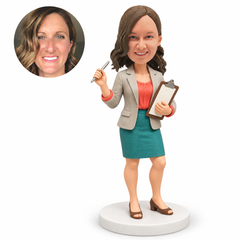 custom bobblehead figure female professor in a blazer holding a pen and clipboard