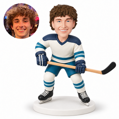 custom bobblehead figure male hockey player holding a stick across his waist with bent knees