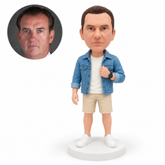 custom bobblehead figure man in an open denim jacket and shorts holding one jacket lapel – original polymer-clay sculpture head and matching photo