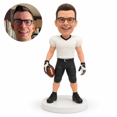 custom bobblehead figure male football player standing with a ball held low and his other arm relaxed