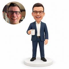 custom bobblehead figure businessman holding a coffee mug with his other arm down