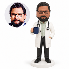 custom bobblehead figure male doctor holding a mug with one hand in his coat pocket