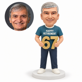 custom bobblehead figure retired man holding a large number 67 with both hands
