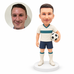 custom bobblehead figure male soccer player holding a ball at his side with his other arm down