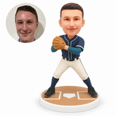 custom bobblehead figure male baseball pitcher in a wide stance holding a glove at his chest on a home-plate base