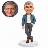 custom bobblehead figure man in a zip jacket standing with crossed ankles and one hand in a trouser pocket MGA-AC1239