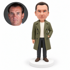 custom bobblehead figure man in a trench coat with one hand in an outer coat pocket MGA-AC1260