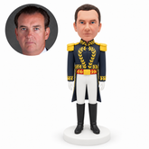 custom bobblehead figure man in a ceremonial tailcoat and sash with both gloved hands down MGA-AC1277
