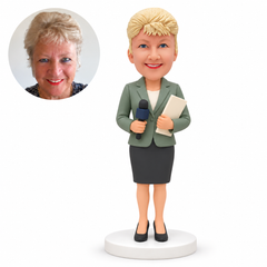 custom bobblehead figure female news reporter in a skirt suit holding a microphone and papers MGA-AC1285