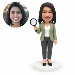 custom bobblehead figure businesswoman holding a magnifying glass with her other arm down MGA-AC1307