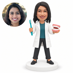 custom bobblehead figure female dentist holding a toothbrush and open dental model