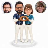 custom bobblehead figures baseball couple making a shared heart with two gloves while embracing