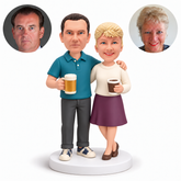 Two custom polymer clay bobblehead figures with matching photo portraits MGA-AC1445