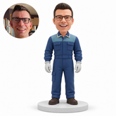 custom bobblehead figure male mechanic in a full coverall with both gloved arms lowered