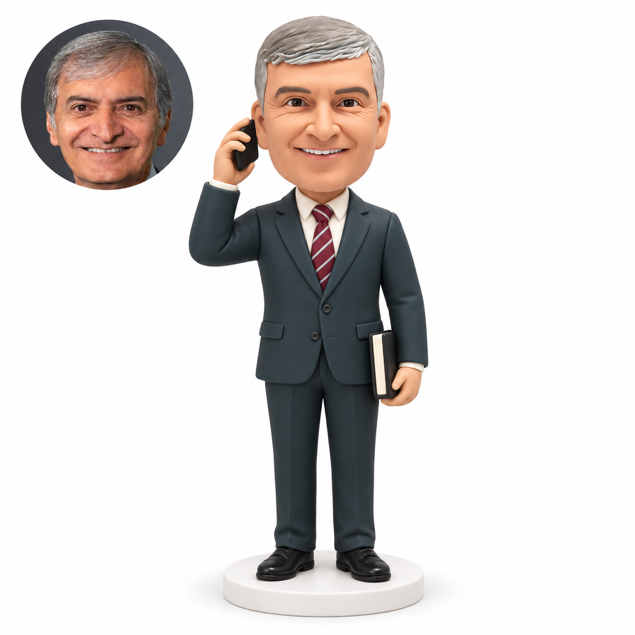 custom bobblehead figure businessman holding a phone beside his head and a book at his side