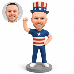 Custom polymer clay bobblehead man in patriotic top hat raising a fist and resting his other hand on hip, with matching portrait