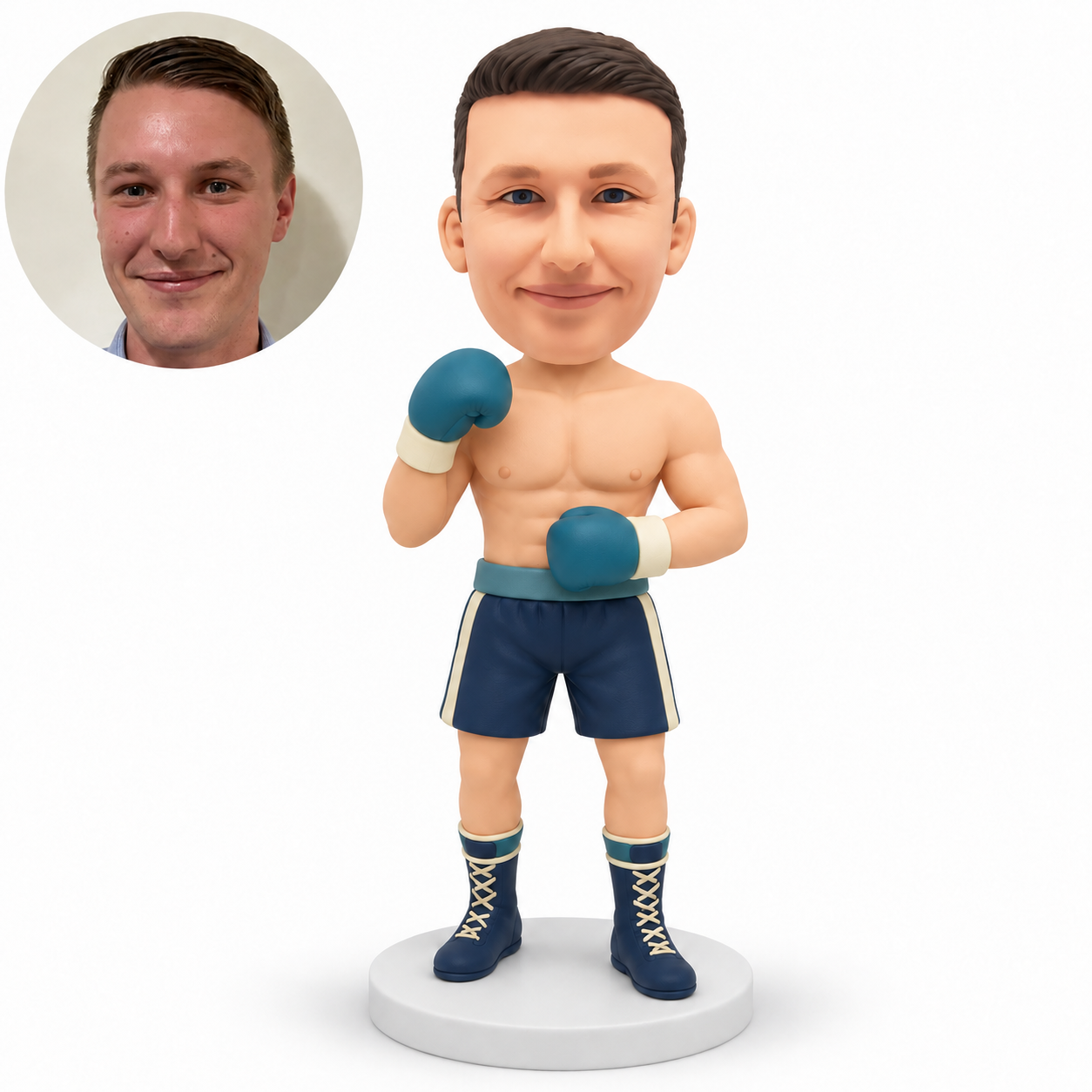 Custom polymer-clay male boxer with one teal glove beside his shoulder and the other across his abdomen, standing in tall navy boxing boots, with matching portrait photo