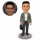 custom bobblehead figure man carrying a bag in his right hand with his left arm down