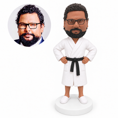 custom bobblehead figure man in a closed bathrobe with both hands on his hips