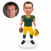 custom bobblehead figure football player holding a football and a helmet