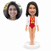custom bobblehead figure female gymnast in a leotard and open jacket wearing medals