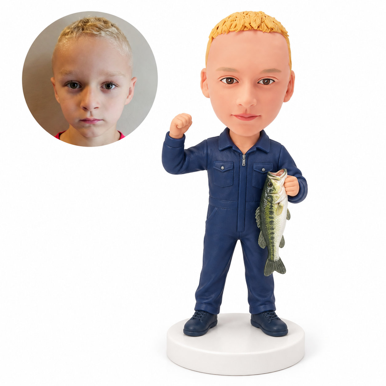 custom bobblehead figure boy angler in coveralls holding a fish and raising a fist