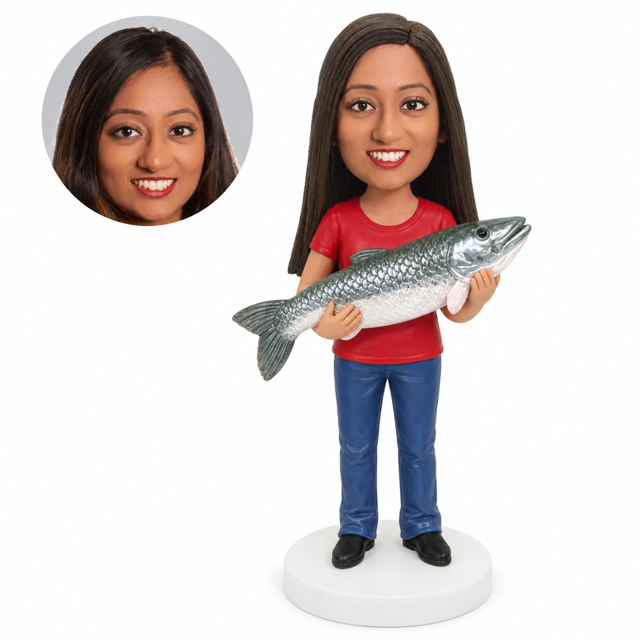 custom bobblehead figure female angler in a T shirt and jeans holding a fish with both hands
