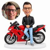 custom bobblehead figure male rider leaning beside a red sport motorcycle