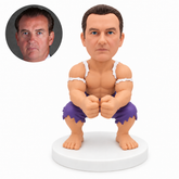 custom bobblehead figure muscular man crouching with both fists held forward