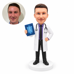 custom bobblehead figure male doctor in a long lab coat holding an X-ray film