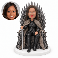 custom bobblehead figure woman in black armor seated on a throne holding a sword