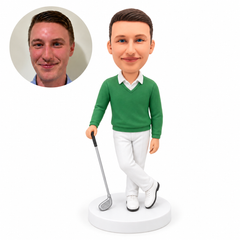 custom bobblehead figure male golfer in a sweater with crossed ankles holding a club at his side
