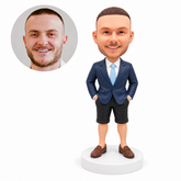 custom bobblehead figure businessman in a blazer and shorts with both hands in his pockets