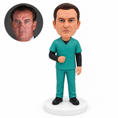 custom bobblehead figure male medical worker in scrubs over long sleeves with one hand near his waist