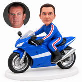 custom bobblehead figure male rider leaning forward on a blue sports motorcycle