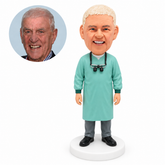 custom bobblehead figure male medical professional in a surgical gown with loupes