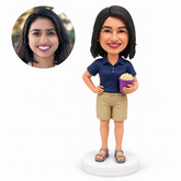 custom bobblehead figure female movie fan in a polo shirt and shorts holding popcorn