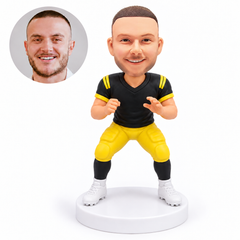 custom bobblehead figure male football player in a wide stance with both hands raised