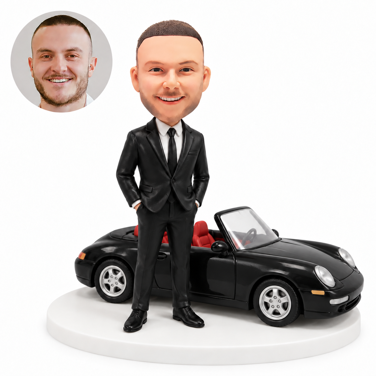 custom bobblehead figure man in a black suit standing beside a black convertible