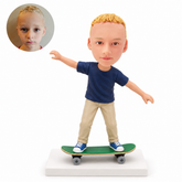 custom bobblehead figure boy in full trousers balancing on a skateboard