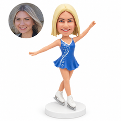 custom bobblehead figure female figure skater in a blue dress with crossed legs