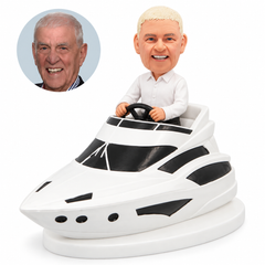 custom bobblehead figure man in a white shirt steering a cabin motor yacht
